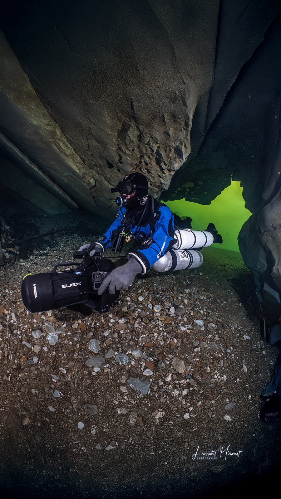 Imad Farhat in sidemount with SUEX DPV inside Le Lot cave Lot Valley France